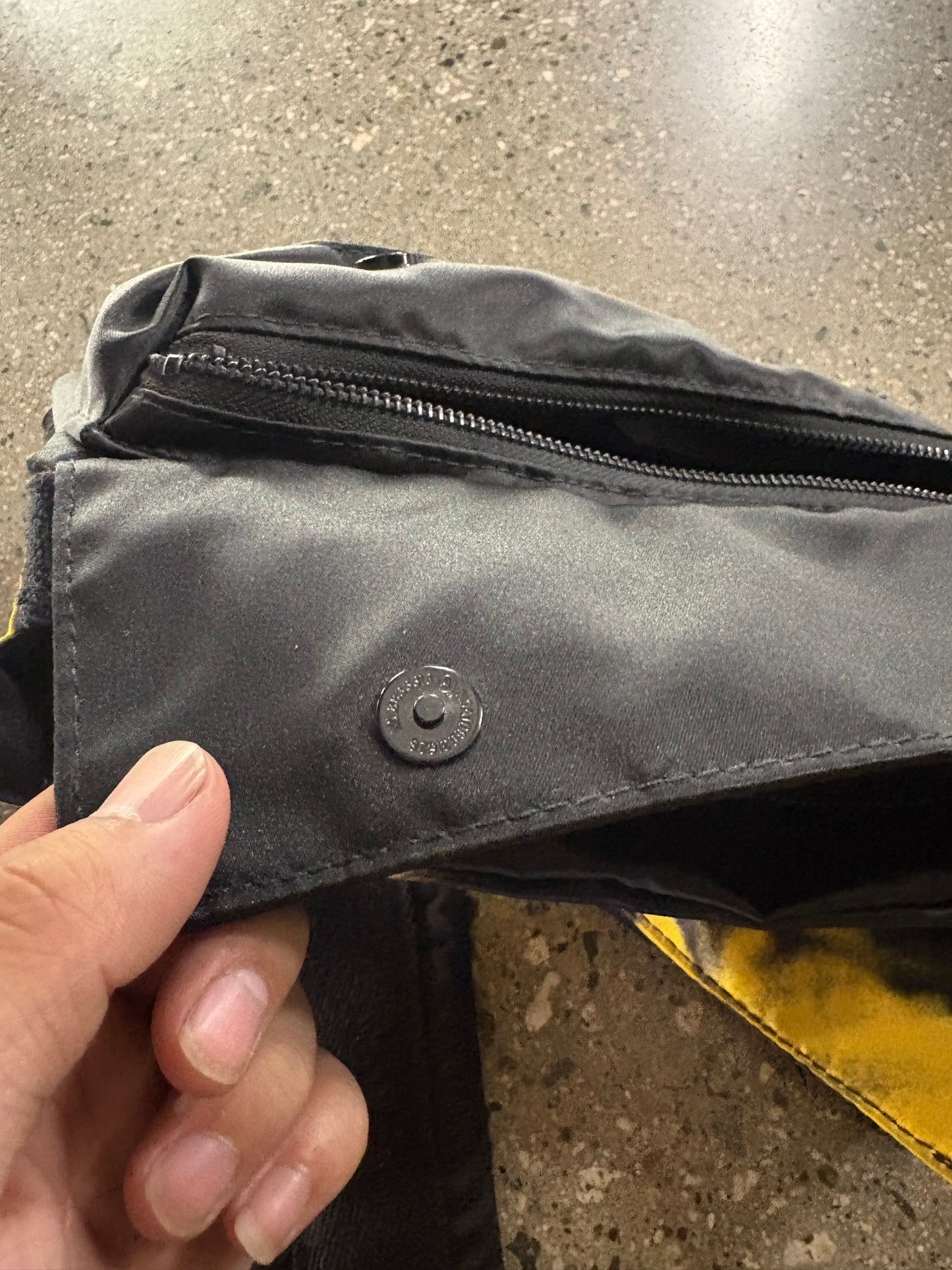 raf Simon’s punk poster crossbody