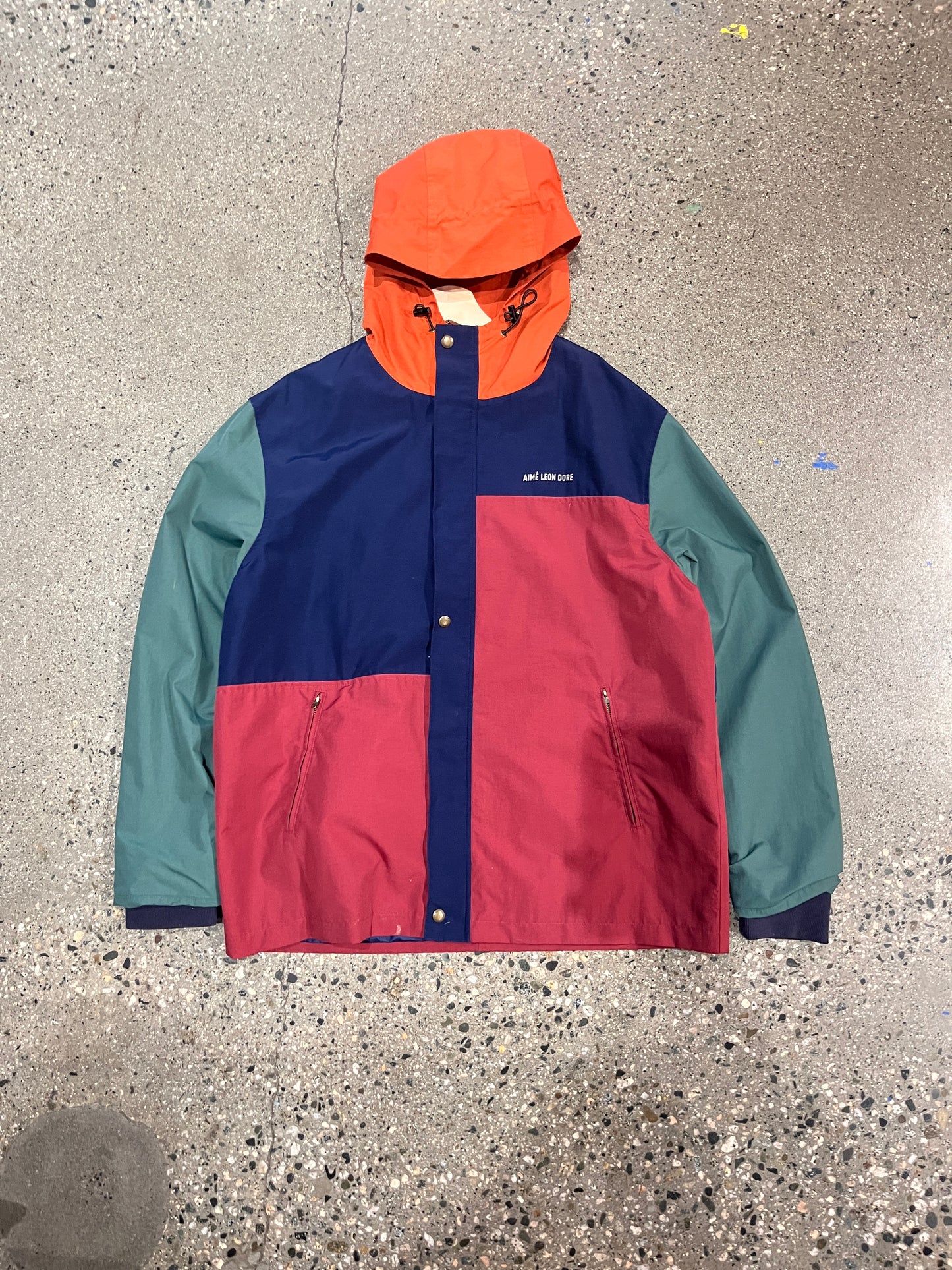 (L) Aimé Leon Dore windbreaker