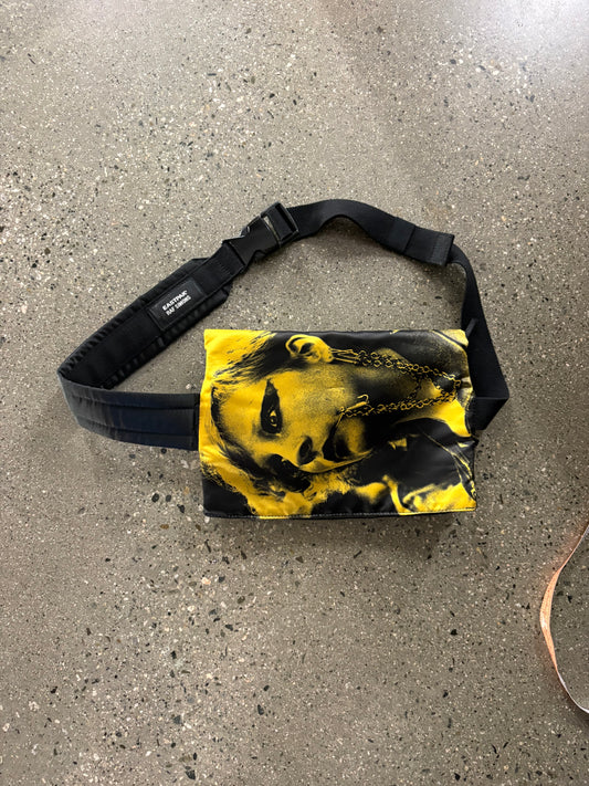raf Simon’s punk poster crossbody