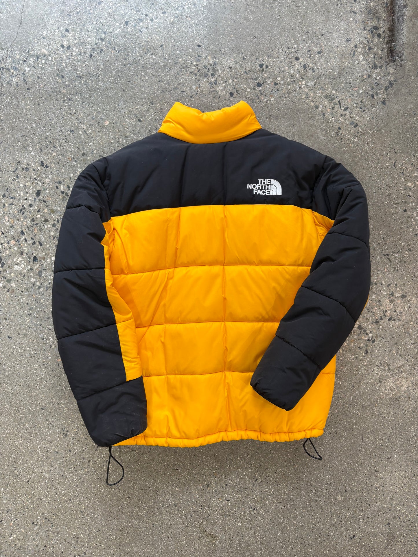 (L) The North Face Himalayan Puffer