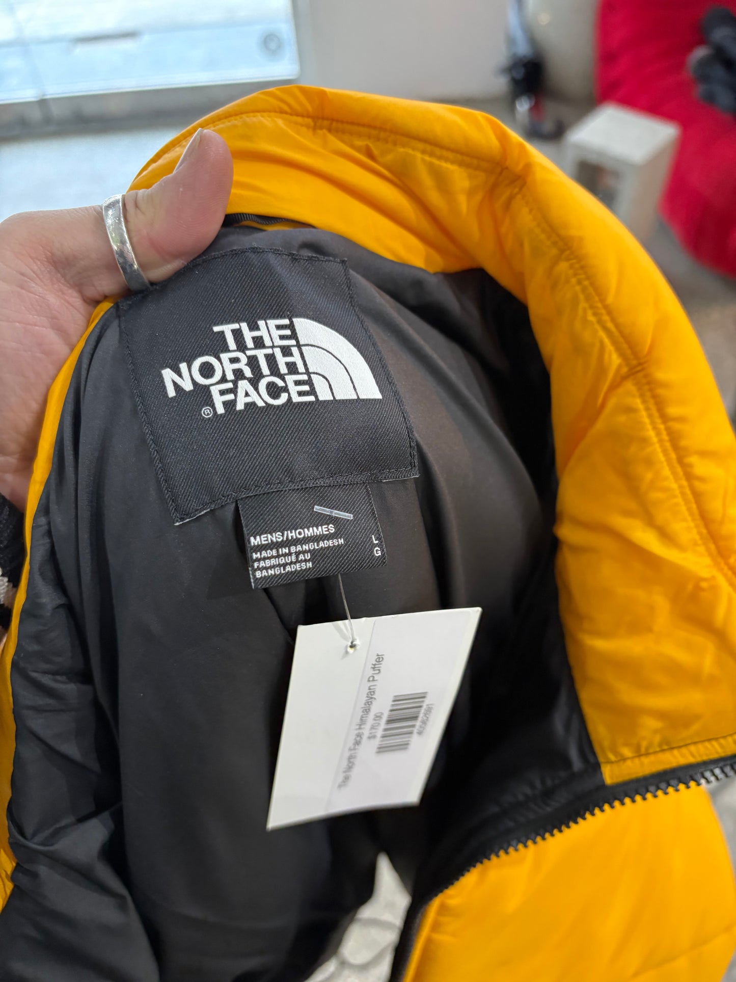 (L) The North Face Himalayan Puffer