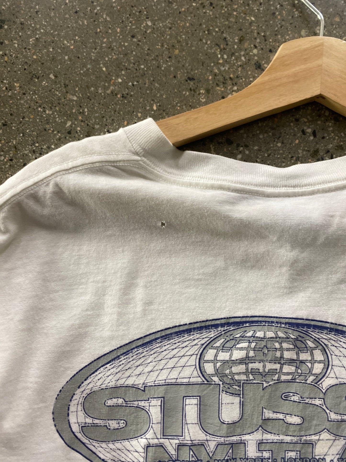 (L) (theerzy.co) 2002 Stussy NYTLA tee ( as is )